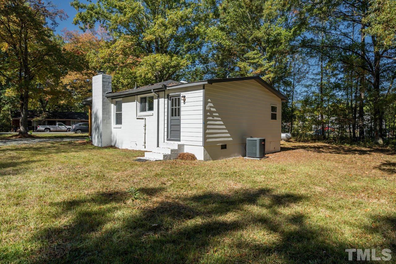 305 School House Road Efland, NC 27243 - Photo 9 of 35 a house with a outdoor space