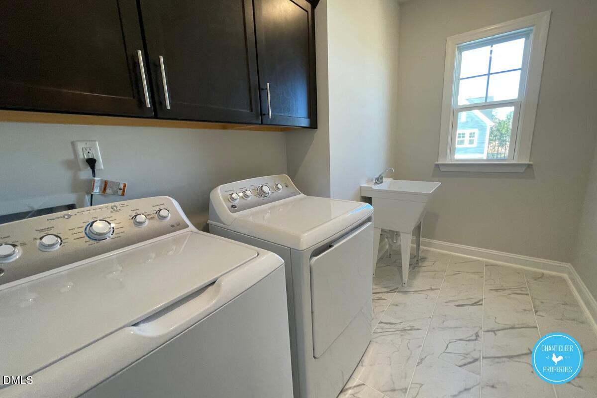 105 Chesapeake Way Chapel Hill, NC 27516 - Photo 15 of 26 a utility room with dryer and washer