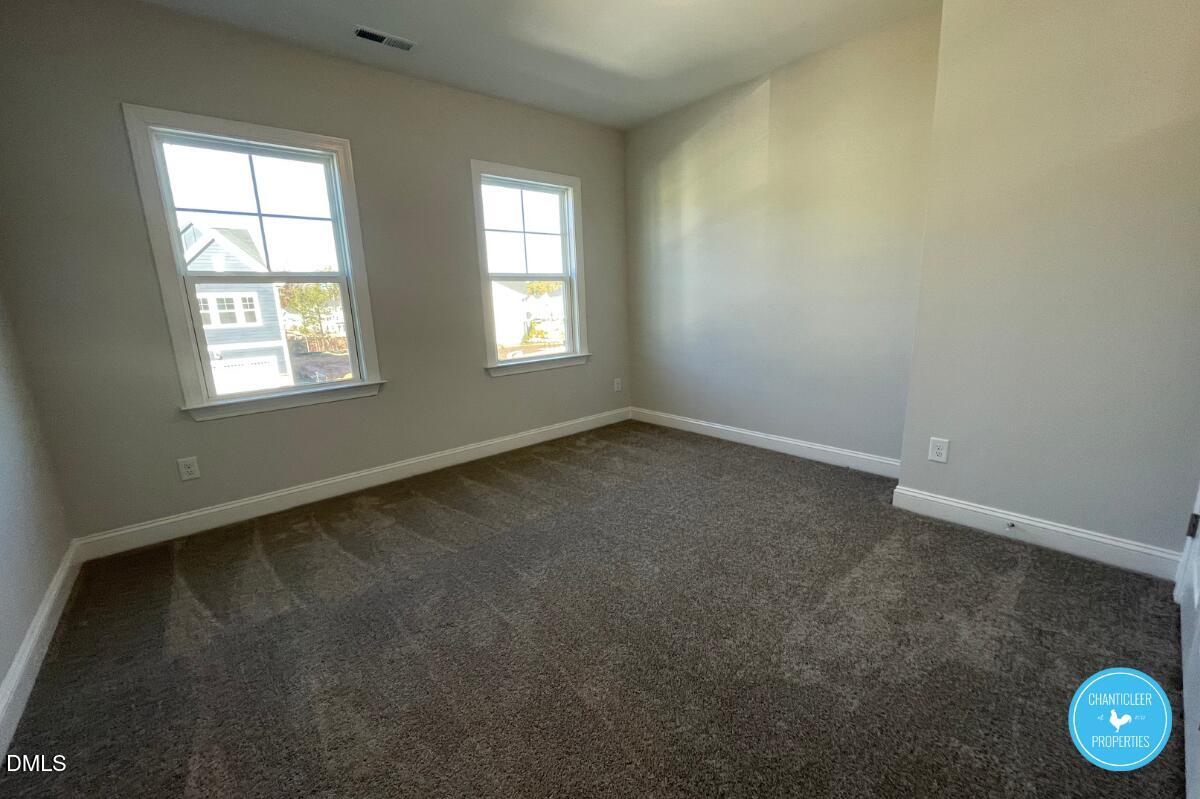 105 Chesapeake Way Chapel Hill, NC 27516 - Photo 17 of 26 an empty room with windows