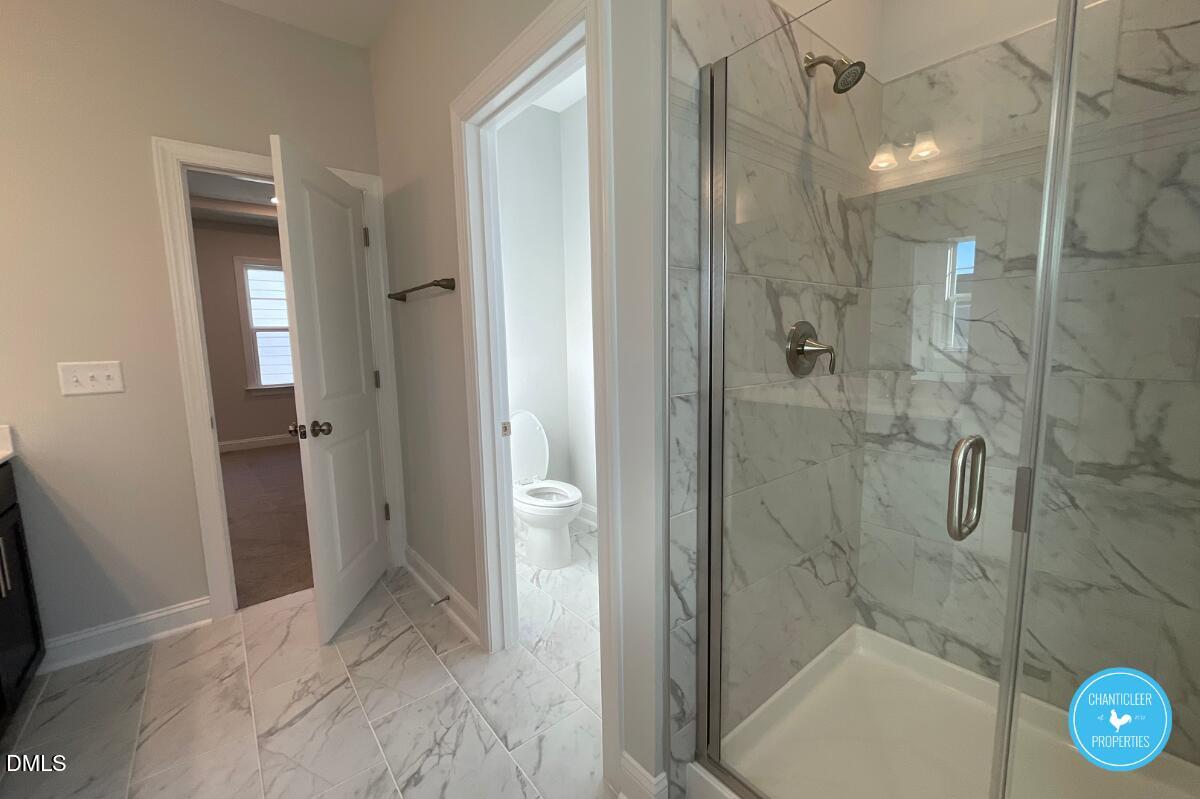 105 Chesapeake Way Chapel Hill, NC 27516 - Photo 22 of 26 a bathroom with a shower and a sink