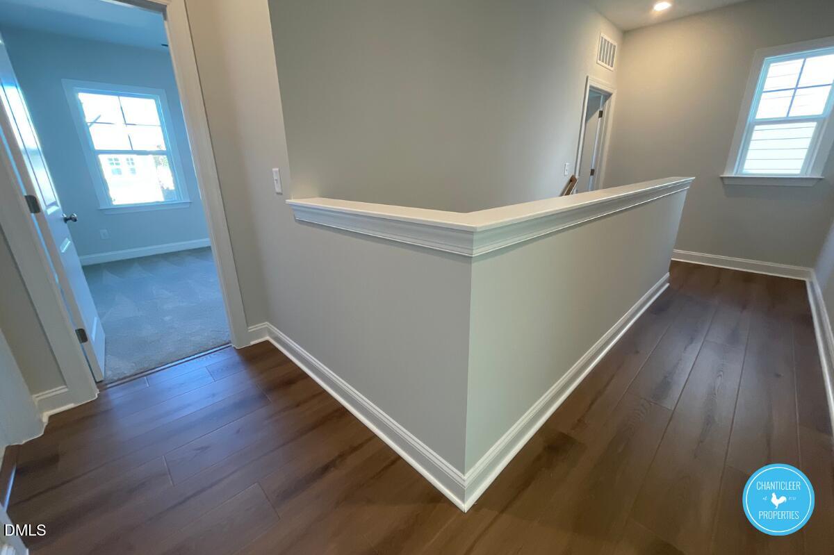 105 Chesapeake Way Chapel Hill, NC 27516 - Photo 23 of 26 wooden floor in an empty room with a window