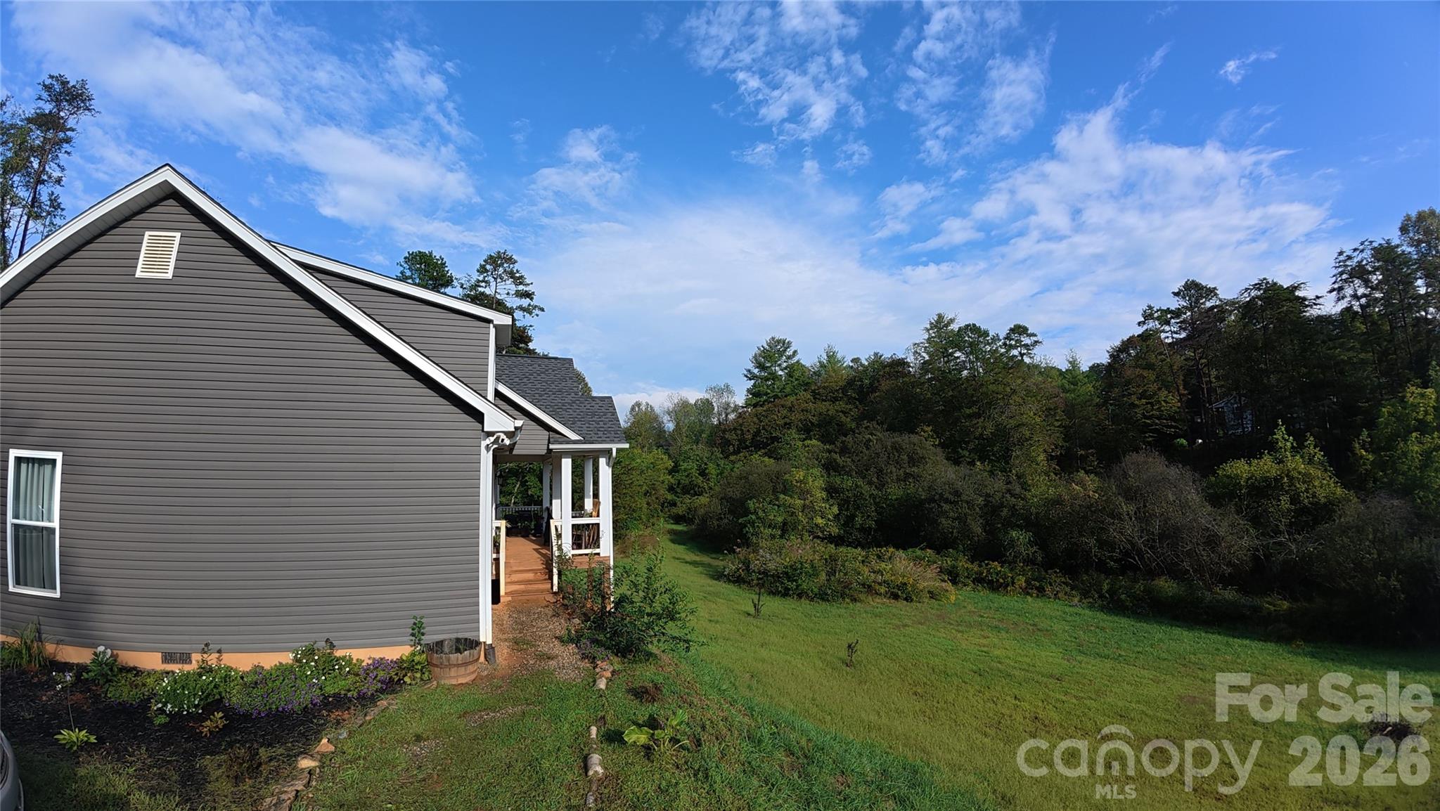 a house with garden in front of it