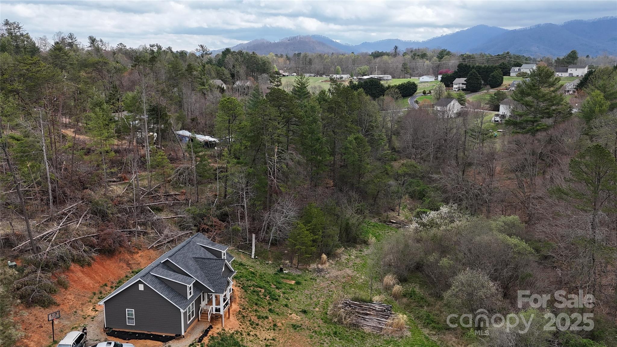 19 Higgins Road Weaverville, NC 28787 - Photo 18 of 48 an aerial view of house with yard and mountain view in back