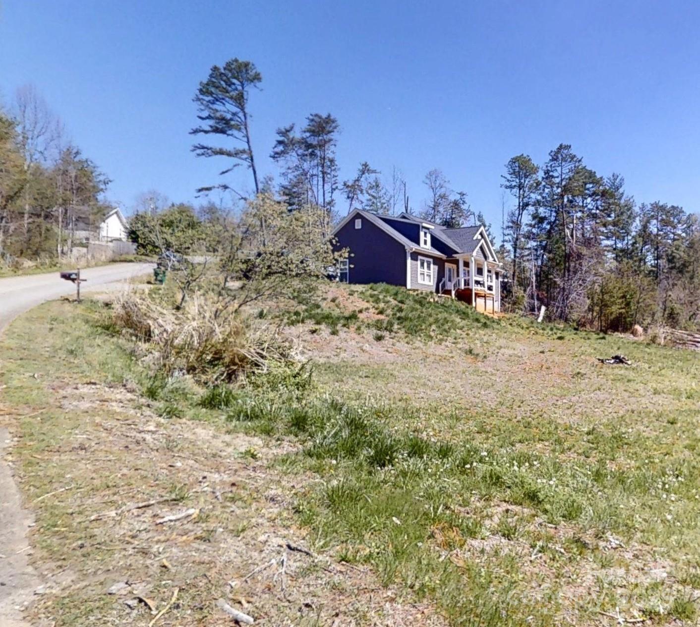 19 Higgins Road Weaverville, NC 28787 - Photo 19 of 48 a view of a dry yard with trees