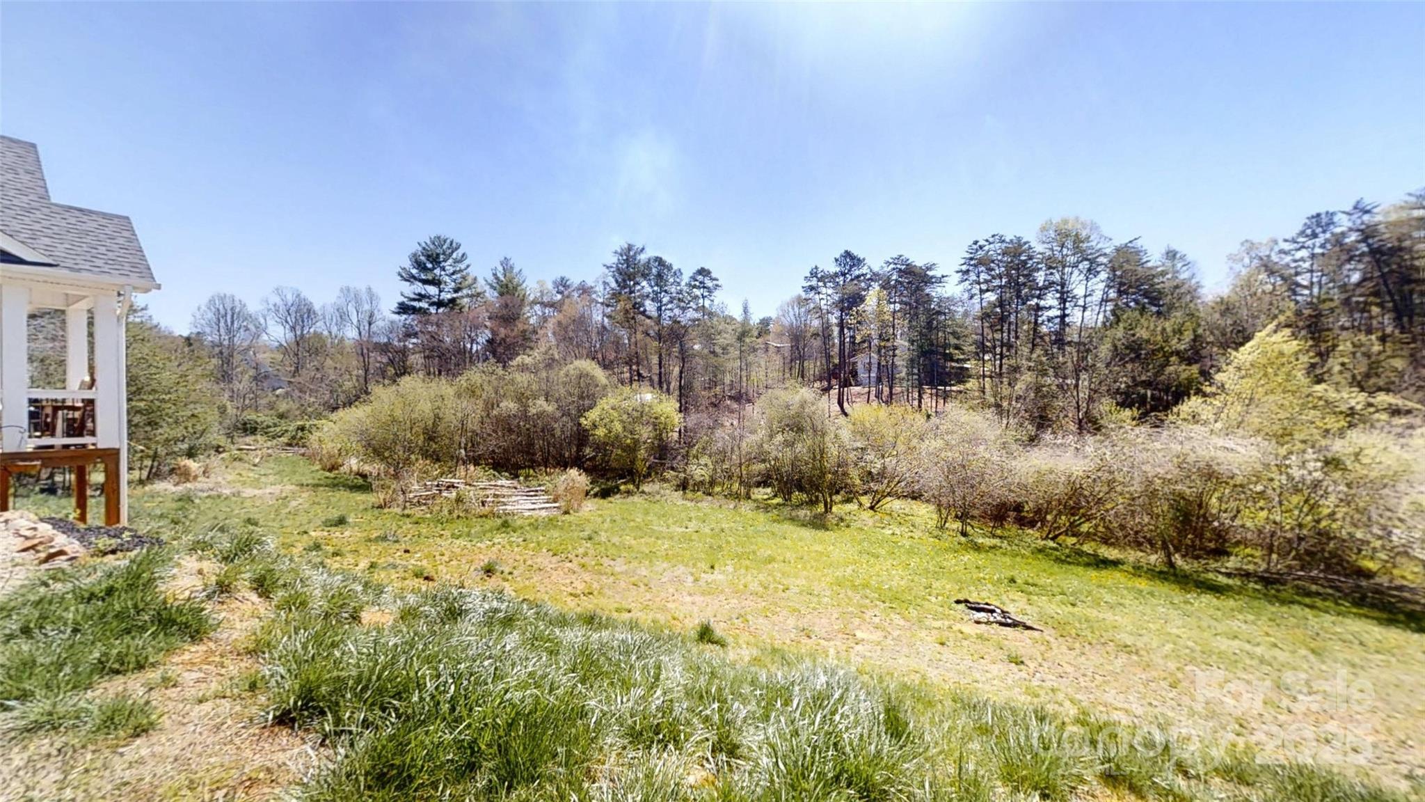 19 Higgins Road Weaverville, NC 28787 - Photo 20 of 48 a view of a yard with a tree