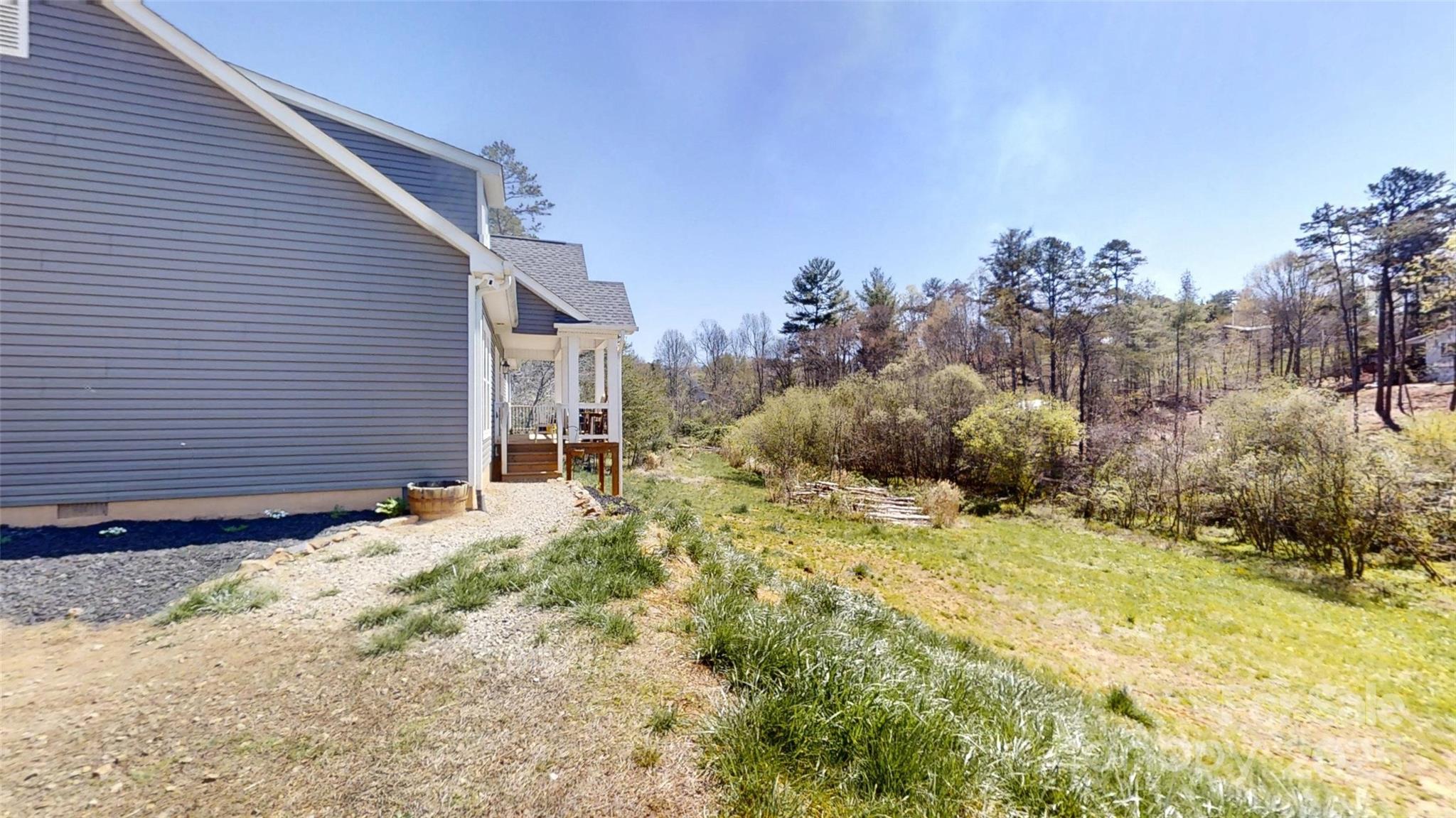 19 Higgins Road Weaverville, NC 28787 - Photo 21 of 48 a view of a house with a snow in the yard