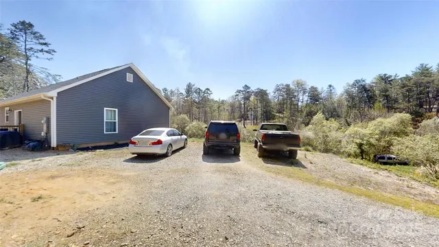 a view of backyard of the house