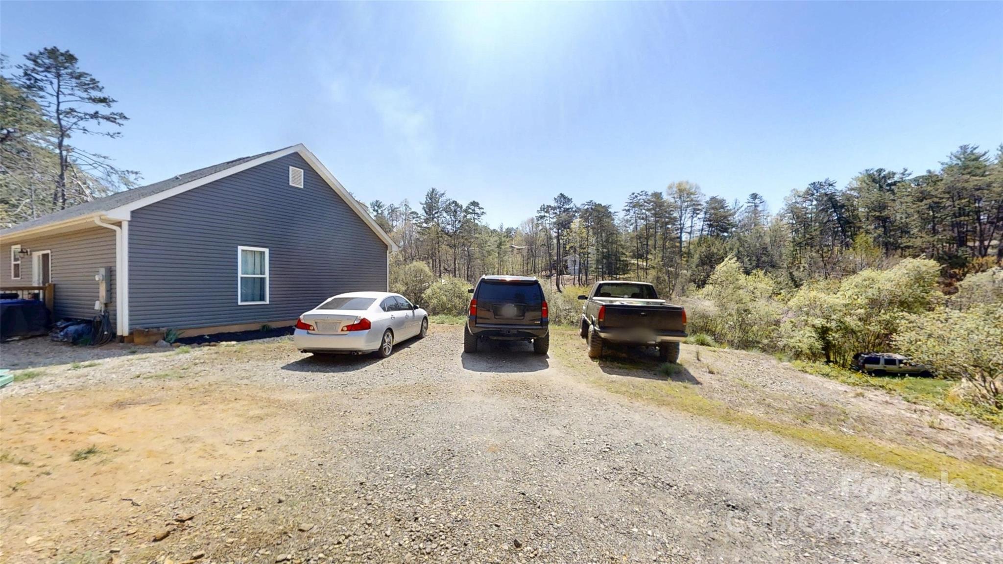 19 Higgins Road Weaverville, NC 28787 - Photo 23 of 48 a car parked in front of a house