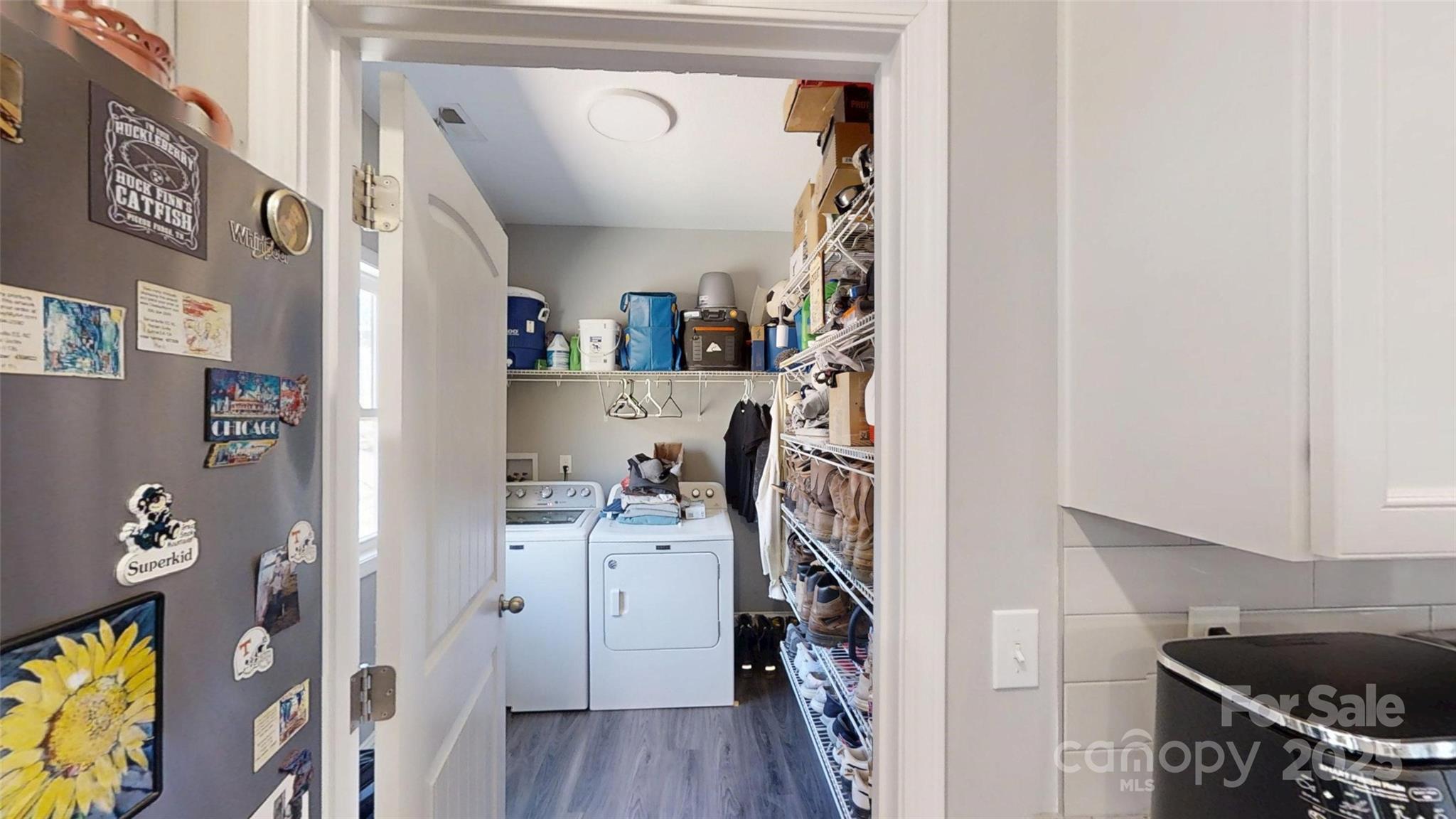 19 Higgins Road Weaverville, NC 28787 - Photo 30 of 48 a view of walk in closet with clothes and shoes
