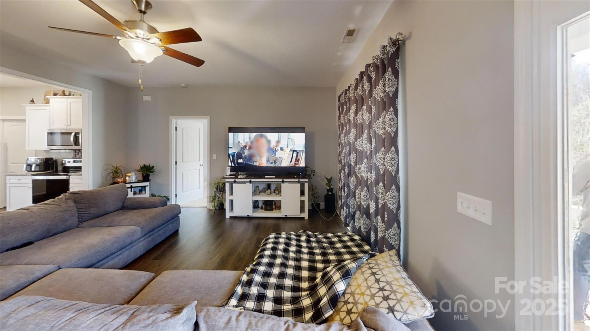 19 Higgins Road Weaverville, NC 28787 - Photo 32 of 48 a living room with furniture and a window