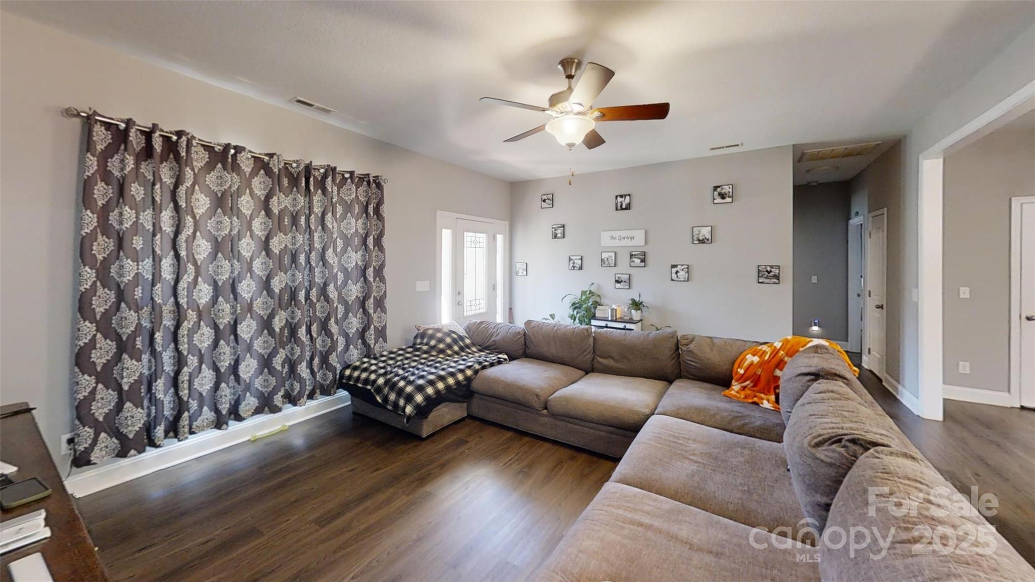 19 Higgins Road Weaverville, NC 28787 - Photo 33 of 48 a living room with furniture and wooden floor