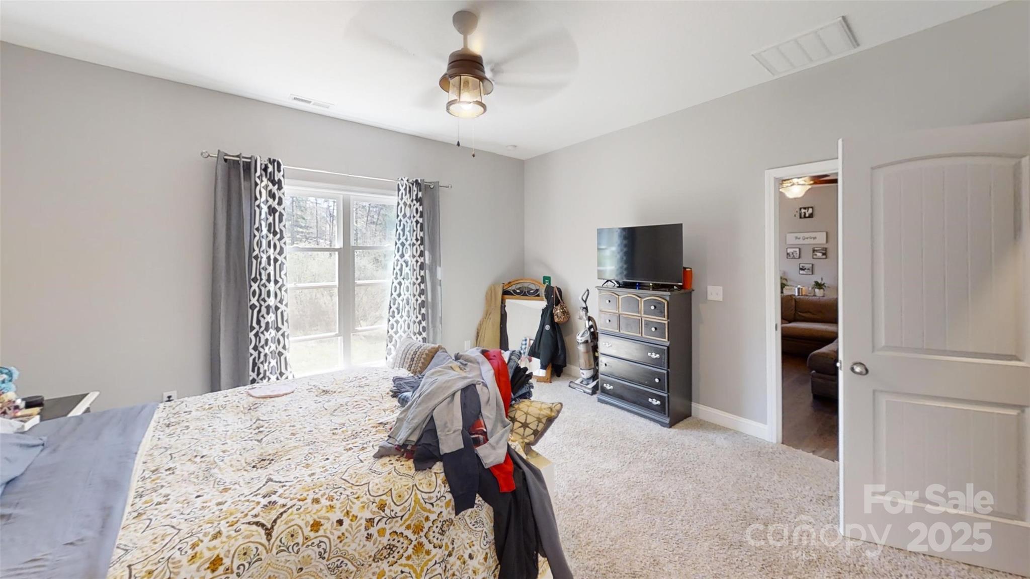 19 Higgins Road Weaverville, NC 28787 - Photo 40 of 48 a view of a bedroom with workspace and natural light