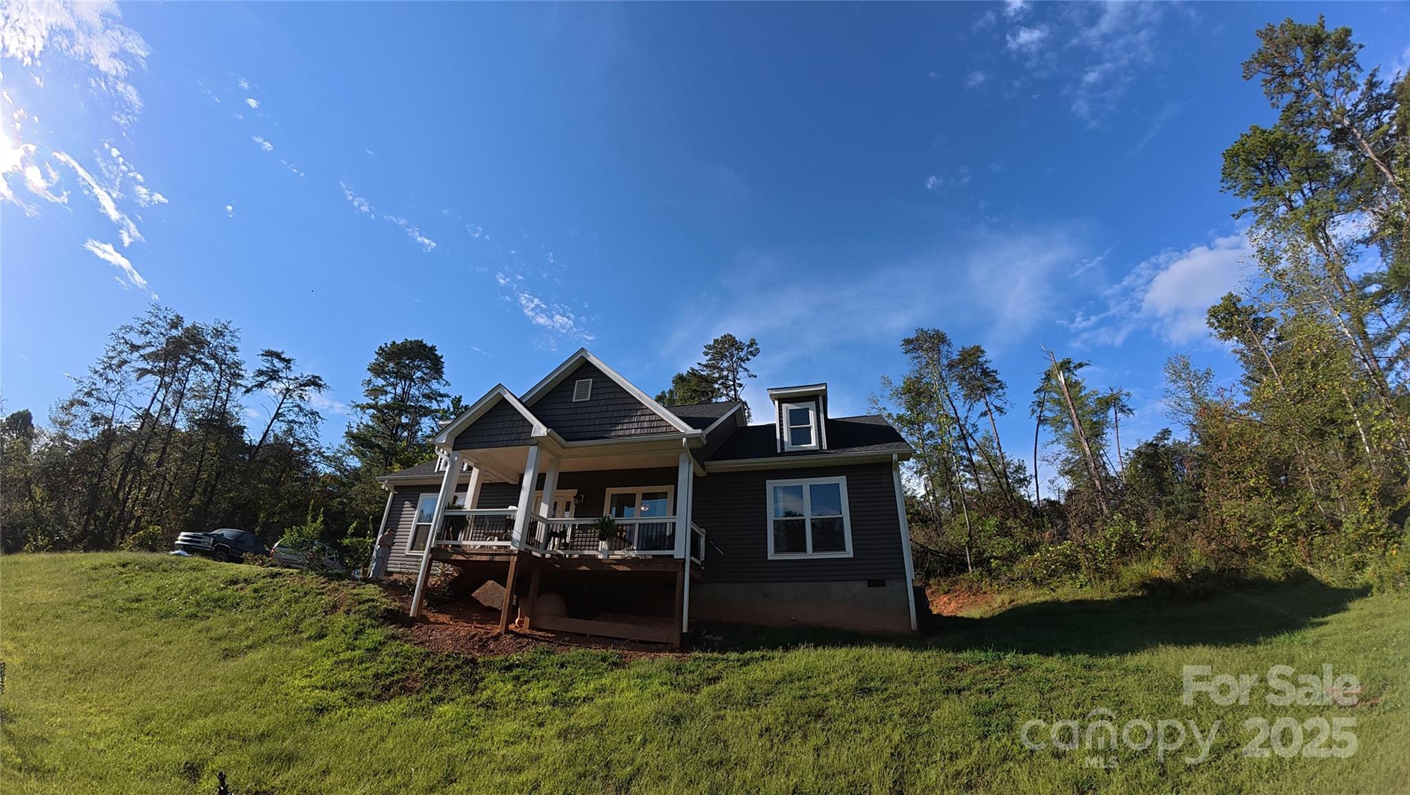 19 Higgins Road Weaverville, NC 28787 - Photo 5 of 48 a view of a house with a yard