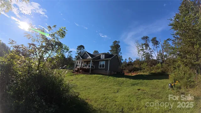 a view of a house with a garden