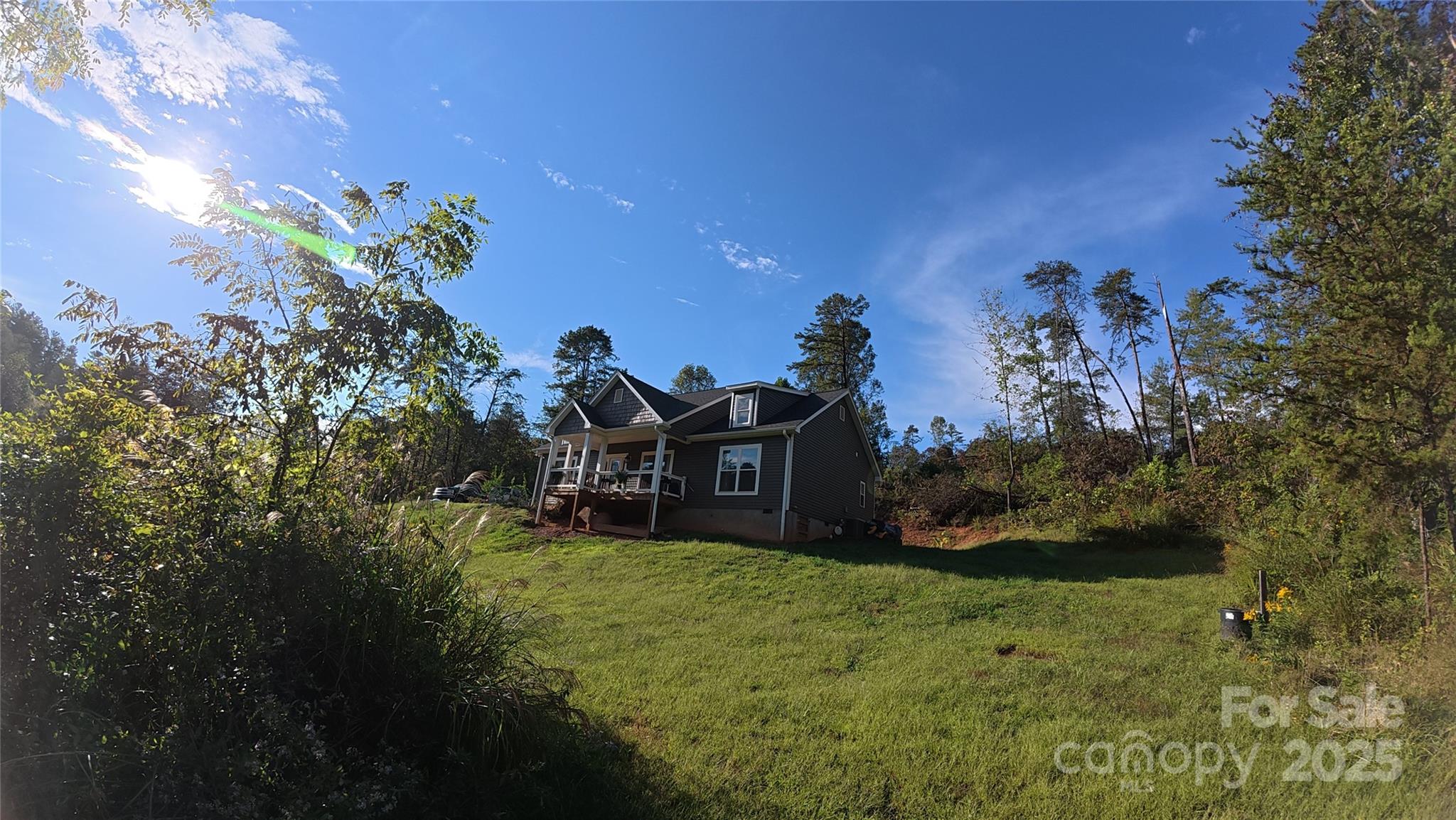 19 Higgins Road Weaverville, NC 28787 - Photo 6 of 48 a view of a house with a garden
