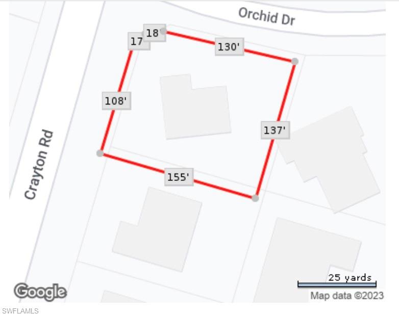 444 Orchid Drive Naples, FL 34102 - Photo 8 of 8 a utility room with dryer and washer