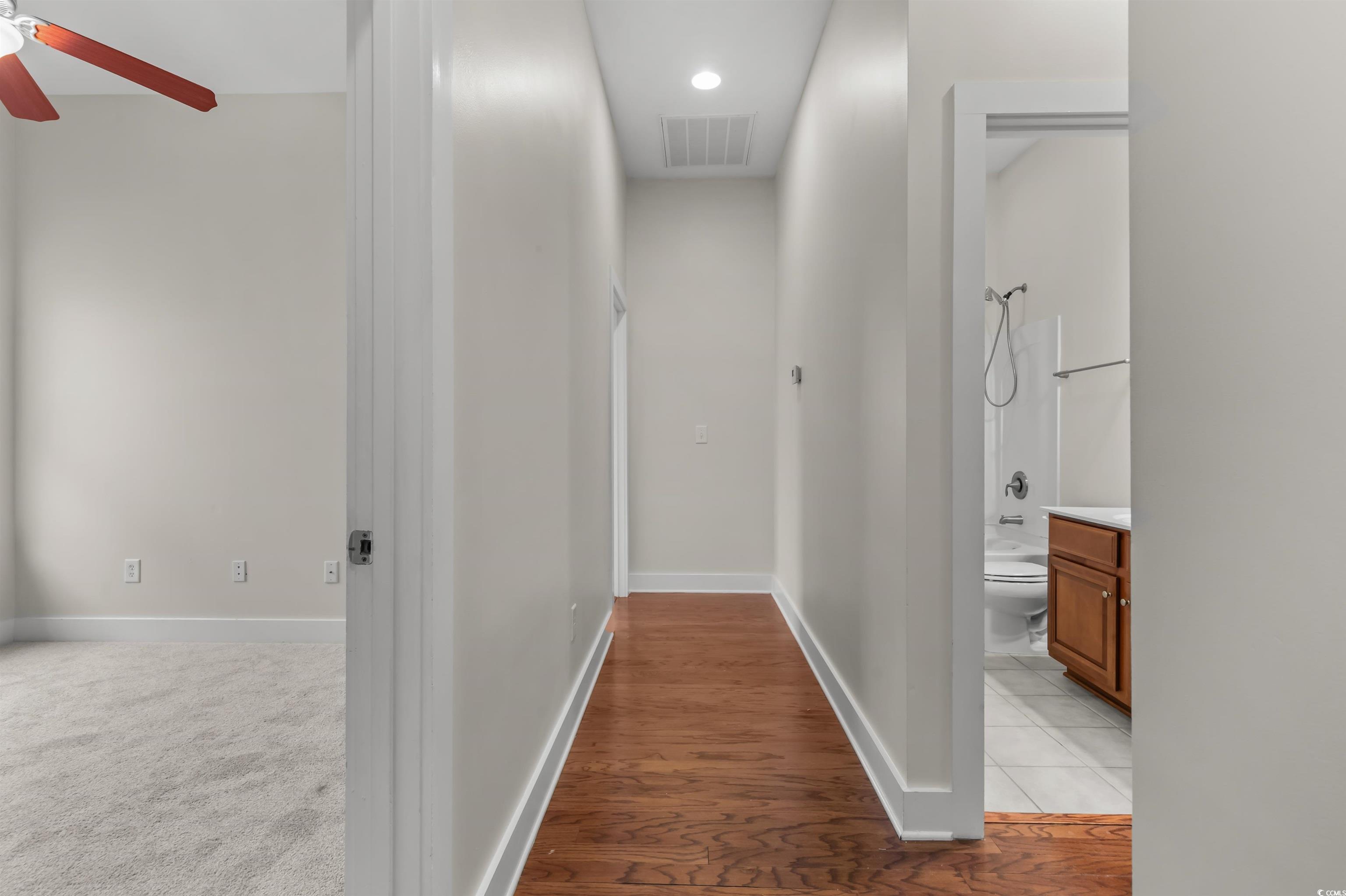 2006 Heritage Loop Myrtle Beach, SC 29577 - Photo 12 of 33 Corridor featuring dark wood finished floors and recessed lighting