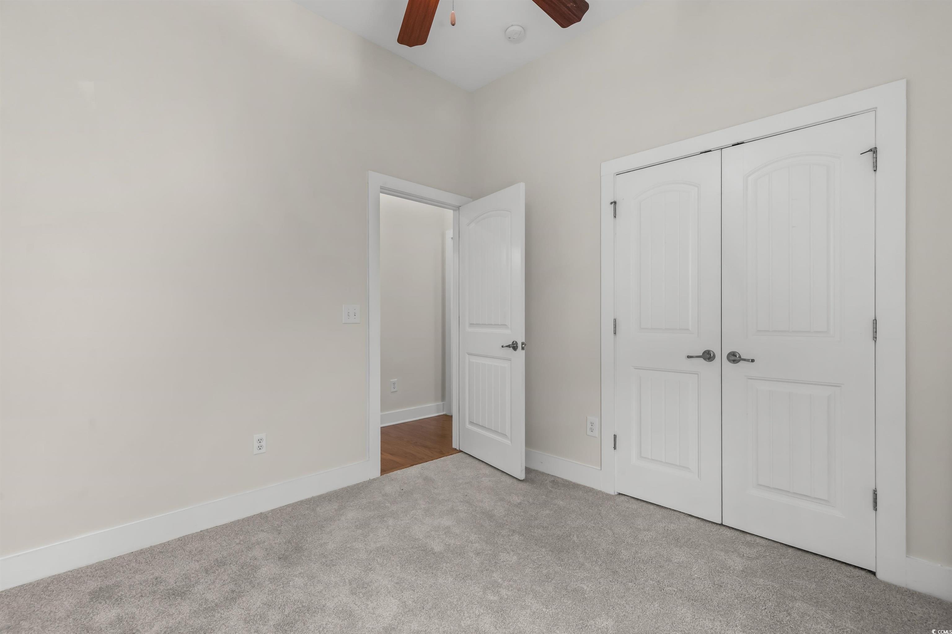 2006 Heritage Loop Myrtle Beach, SC 29577 - Photo 20 of 33 Unfurnished bedroom featuring carpet floors, a closet, and ceiling fan