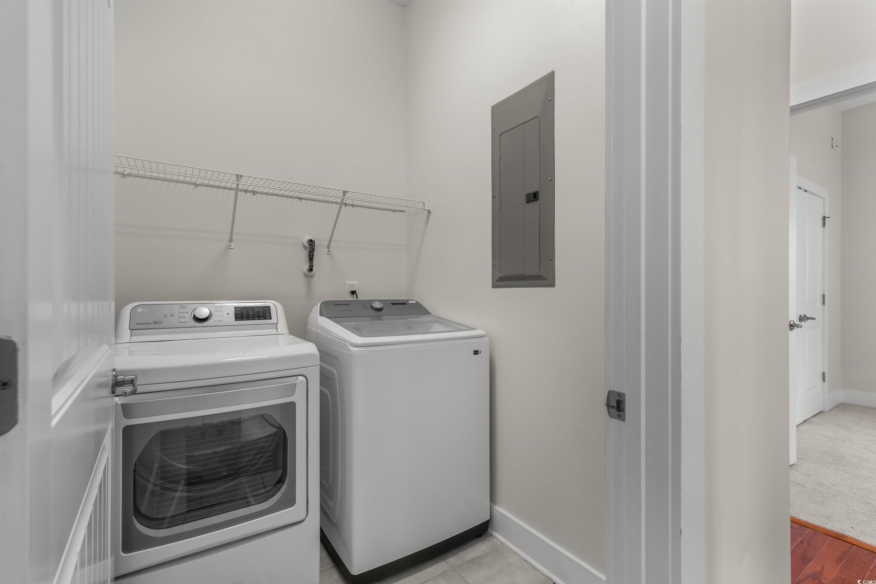 2006 Heritage Loop Myrtle Beach, SC 29577 - Photo 21 of 33 Washroom featuring electric panel and independent washer and dryer