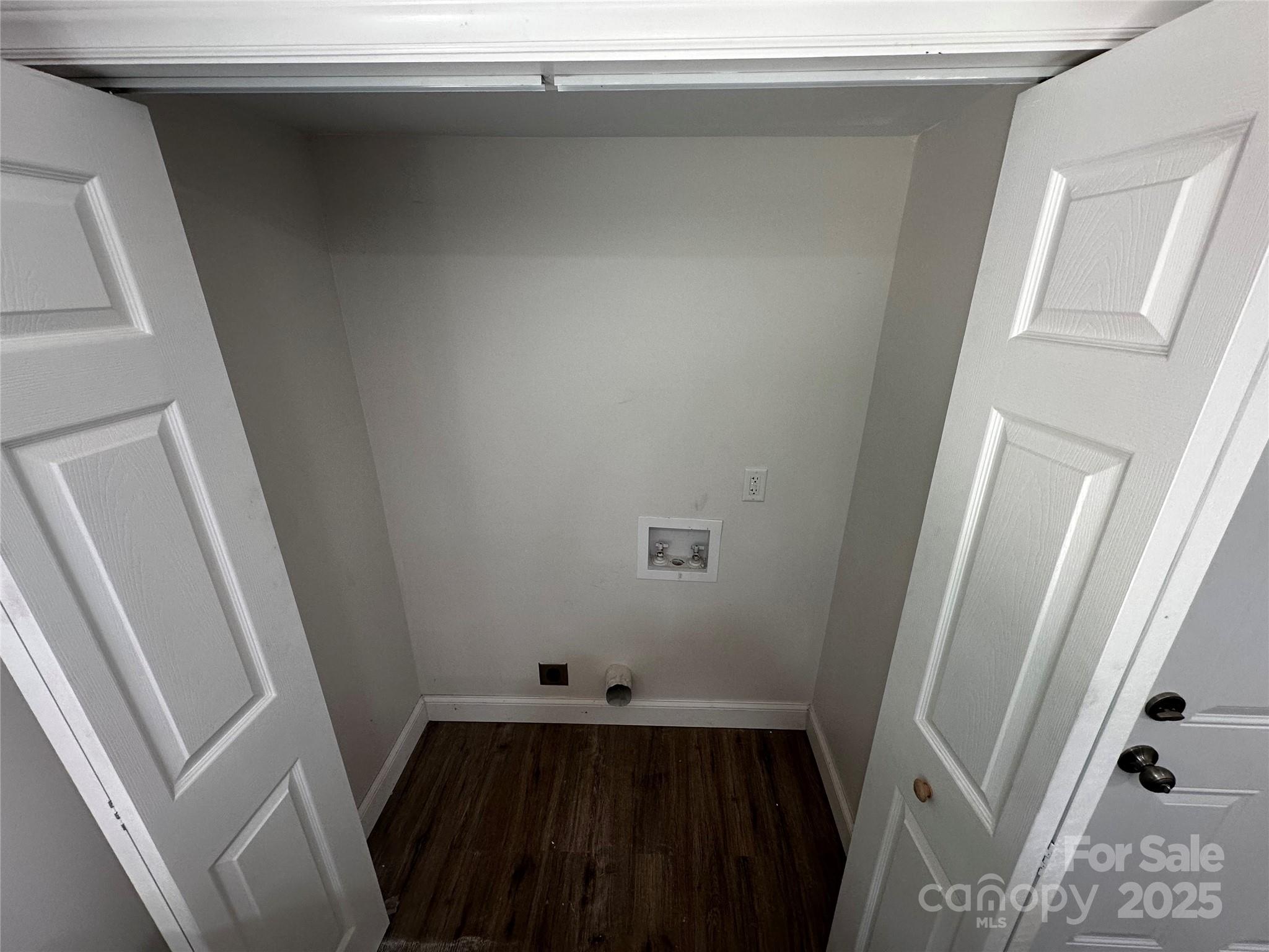 801 Calhoun Street Lancaster, SC 29720 - Photo 11 of 12 a view of a closet with wooden floor