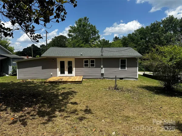 a front view of a house with yard
