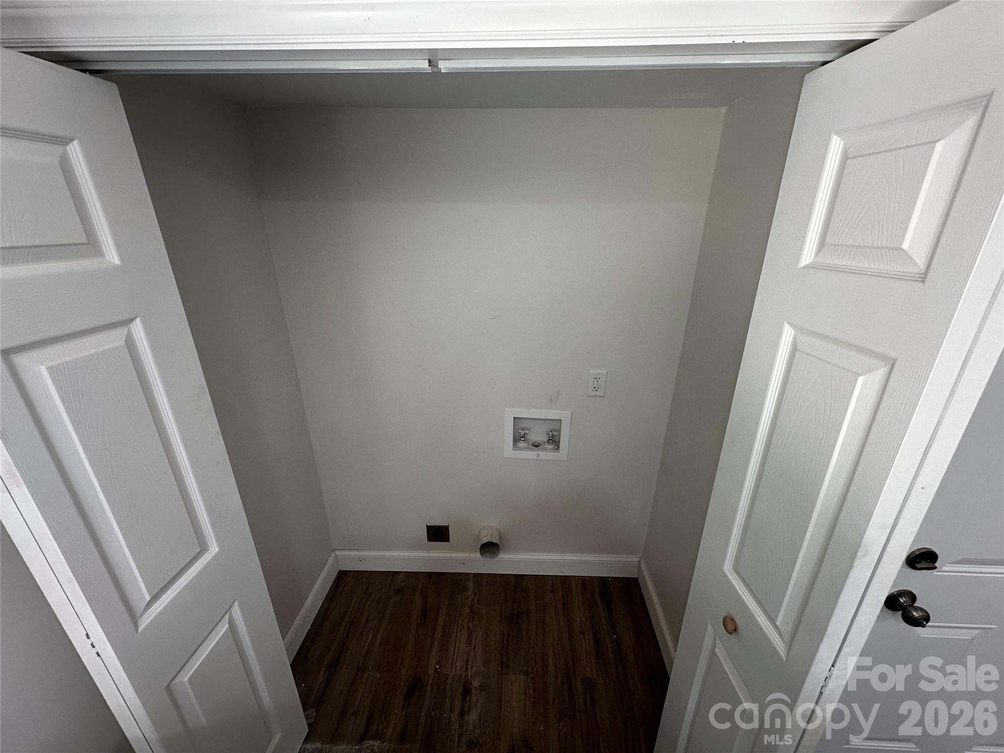 801 Calhoun Street Lancaster, SC 29720 - Photo 10 of 11 a view of a closet with wooden floor