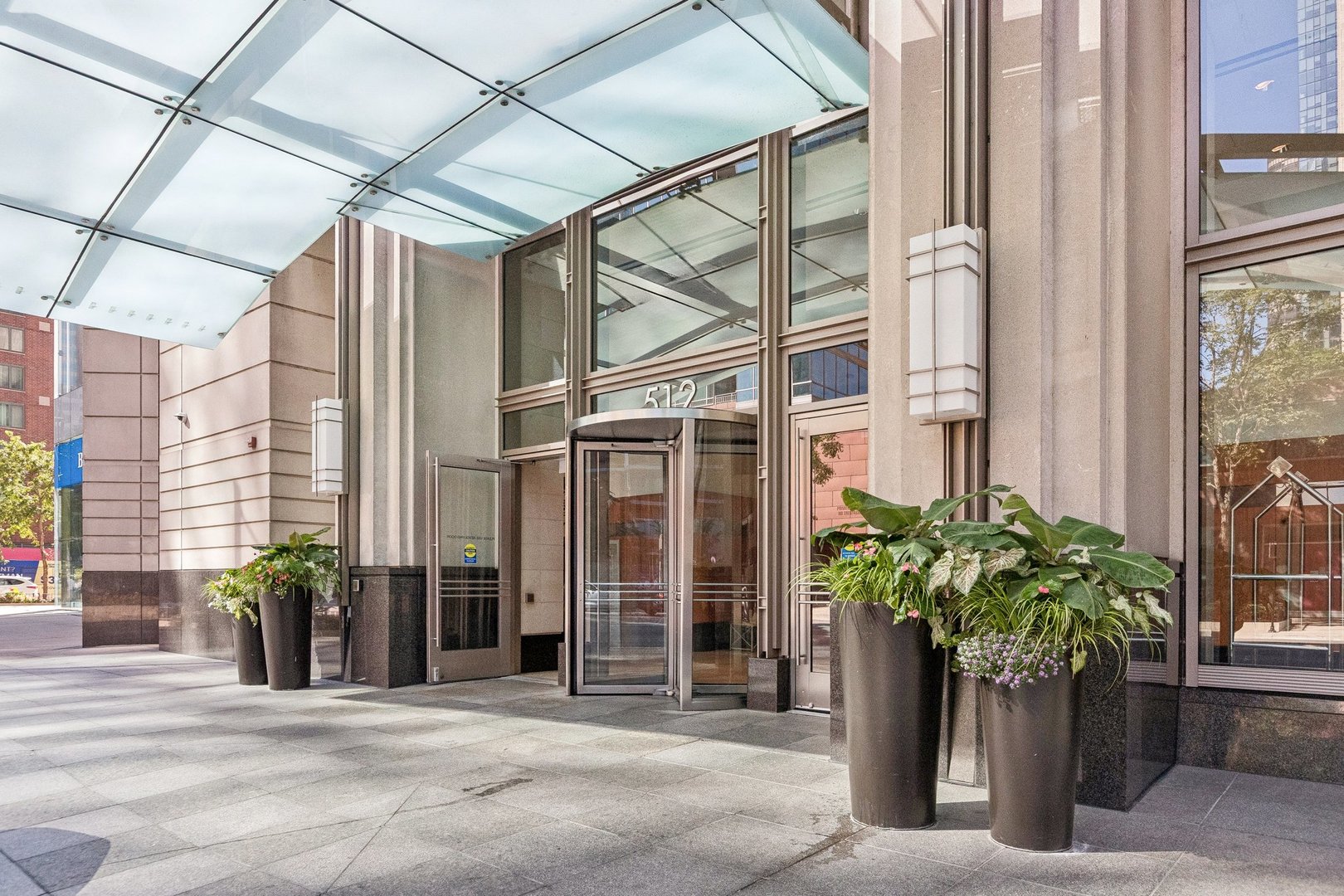 512 North McClurg Court, Unit 3312 Chicago, IL 60611 - Photo 2 of 47 a potted plant sitting in front of a building