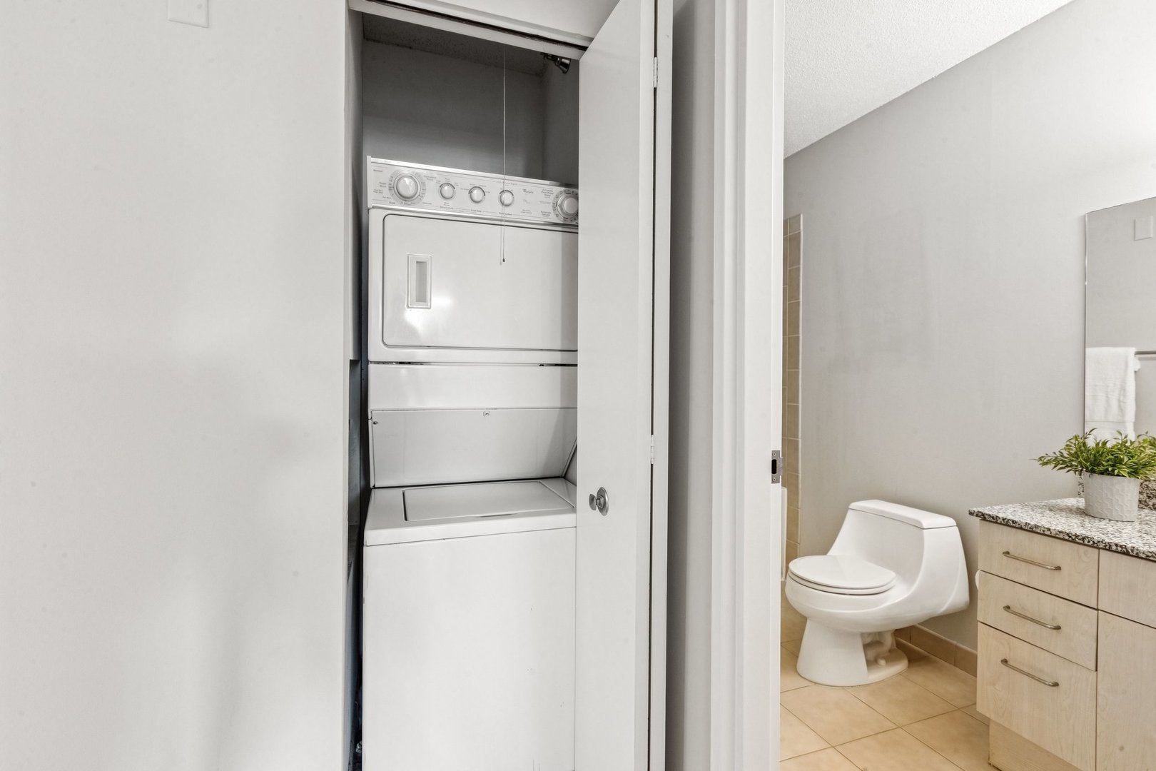 512 North McClurg Court, Unit 3312 Chicago, IL 60611 - Photo 28 of 47 a white toilet sitting next to a bathroom sink