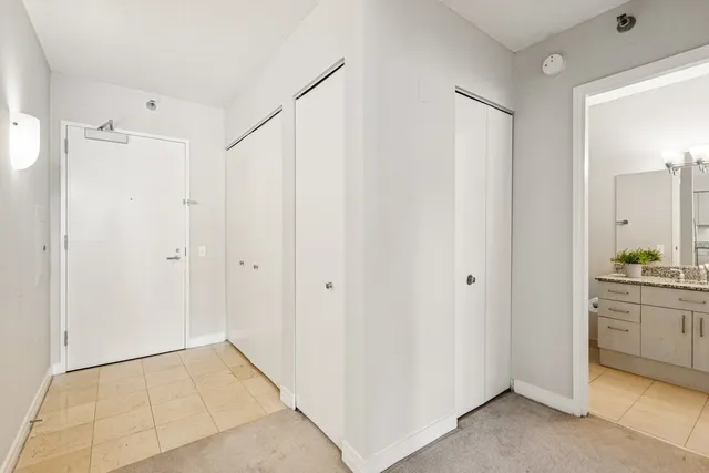 a view of a kitchen with a sink
