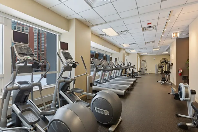 a gym room with gym equipment