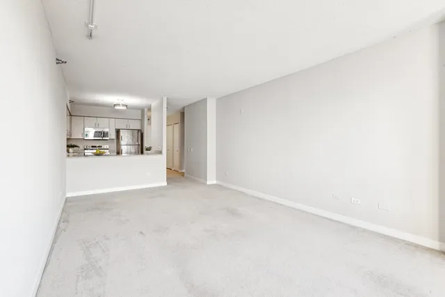 a view of a kitchen with a sink