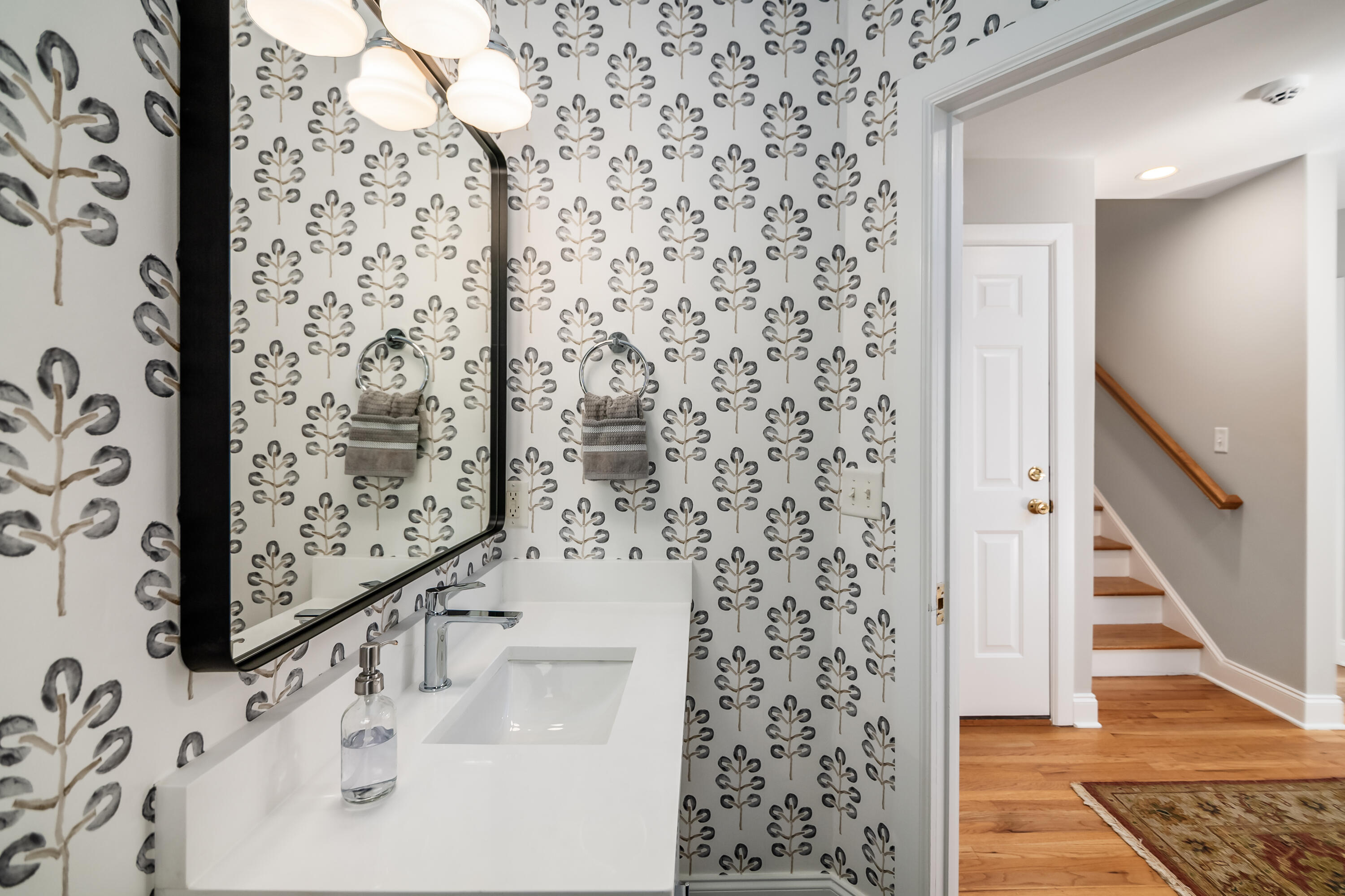 156 Tradd Street, Unit E Charleston, SC 29401 - Photo 8 of 55 First Floor Powder Room to Stairs