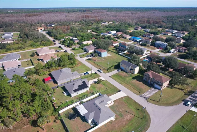 an aerial view of a city with lots of residential buildings