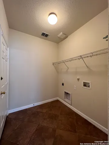 a view of a room with an empty space