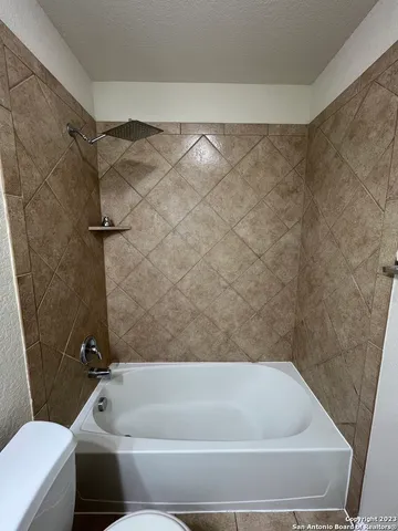 a bathroom with a bathtub