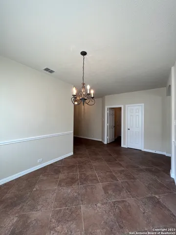 a view of a room with an empty space