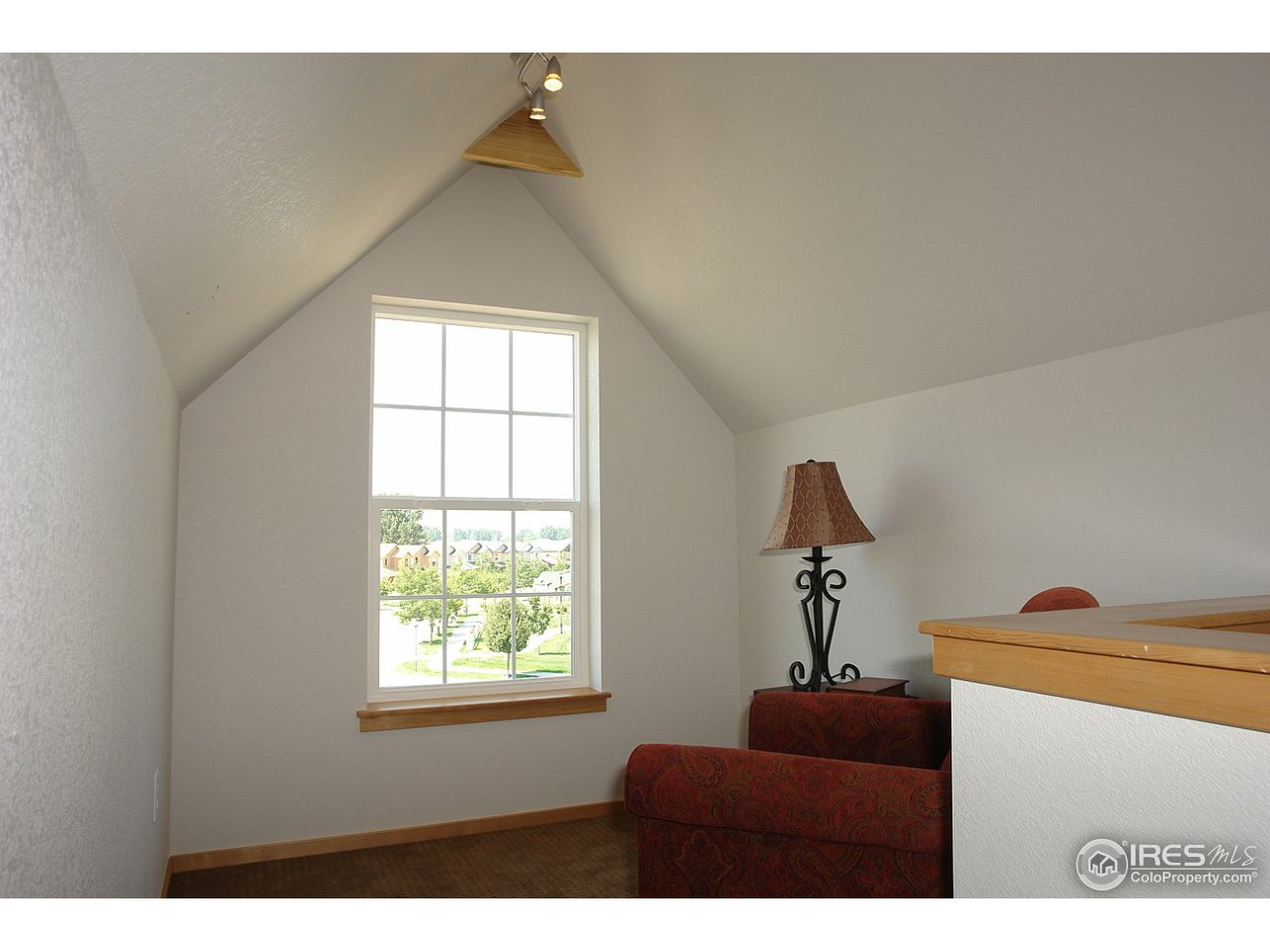 2834 Rigden Parkway Fort Collins, CO 80525 - Photo 15 of 18 a living room with furniture and a window