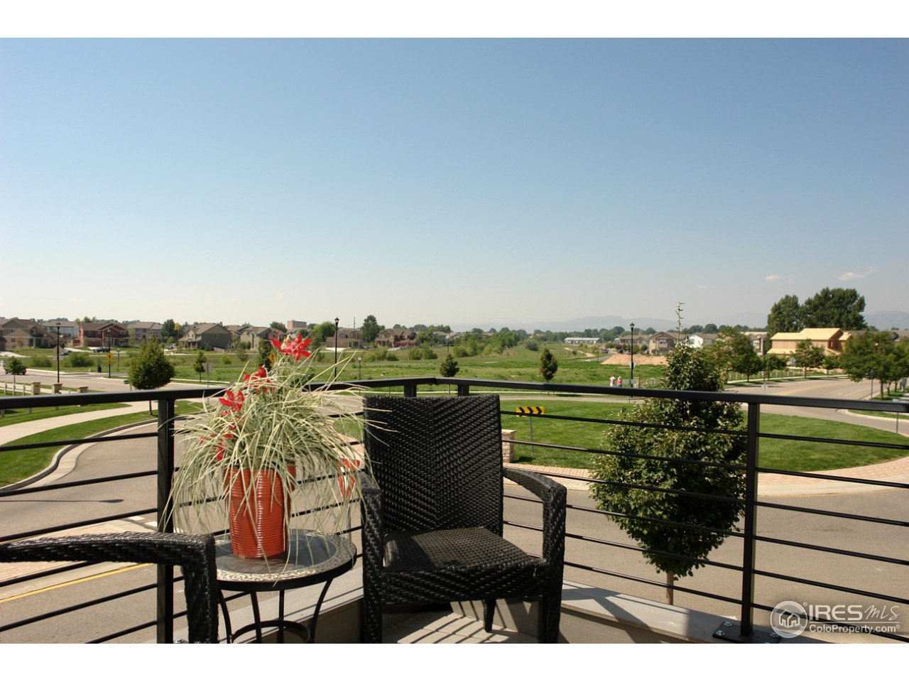 2834 Rigden Parkway Fort Collins, CO 80525 - Photo 18 of 18 a view of a chairs and table on the terrace