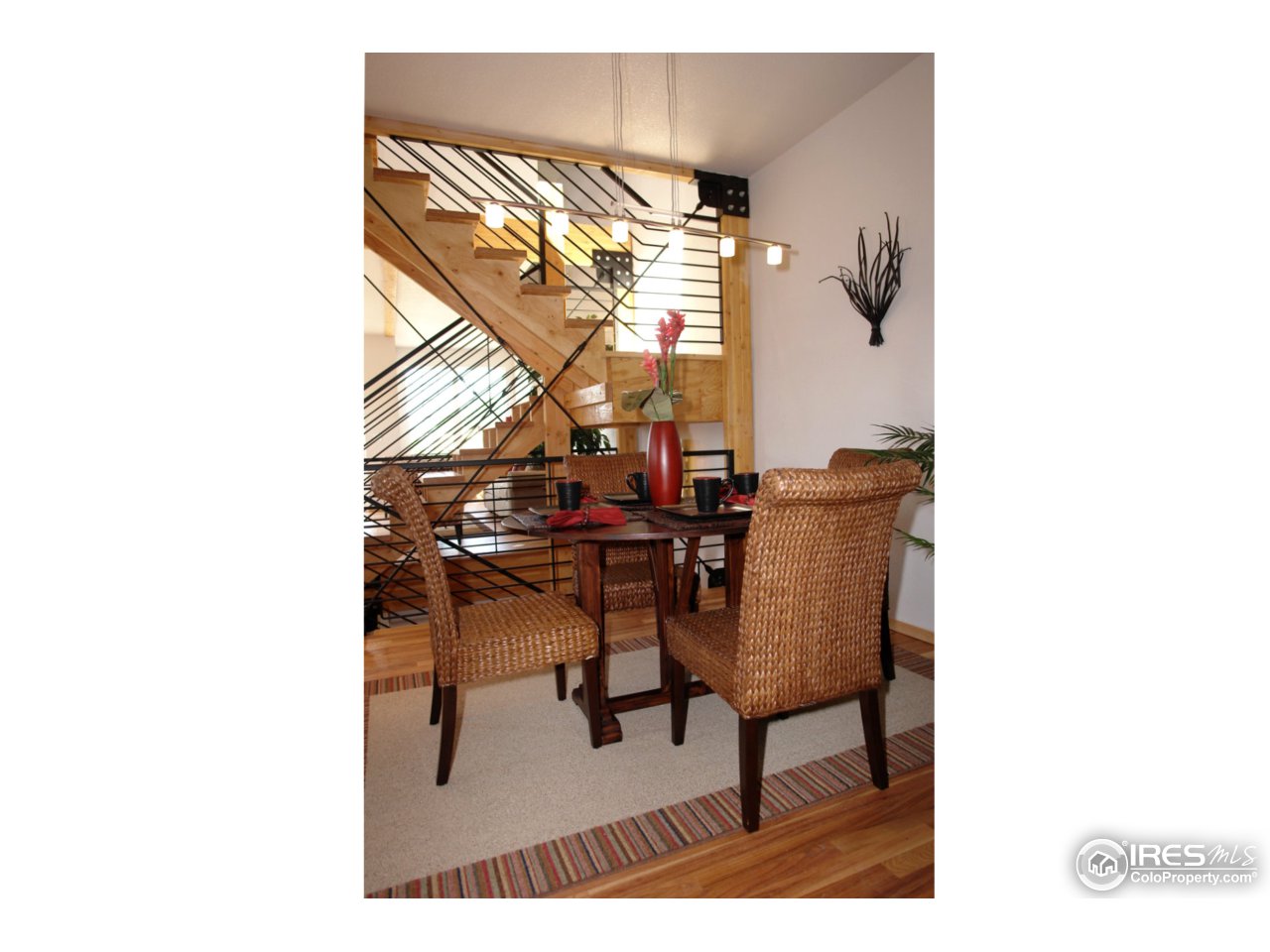 2834 Rigden Parkway Fort Collins, CO 80525 - Photo 5 of 18 a view of a room with a table and chairs
