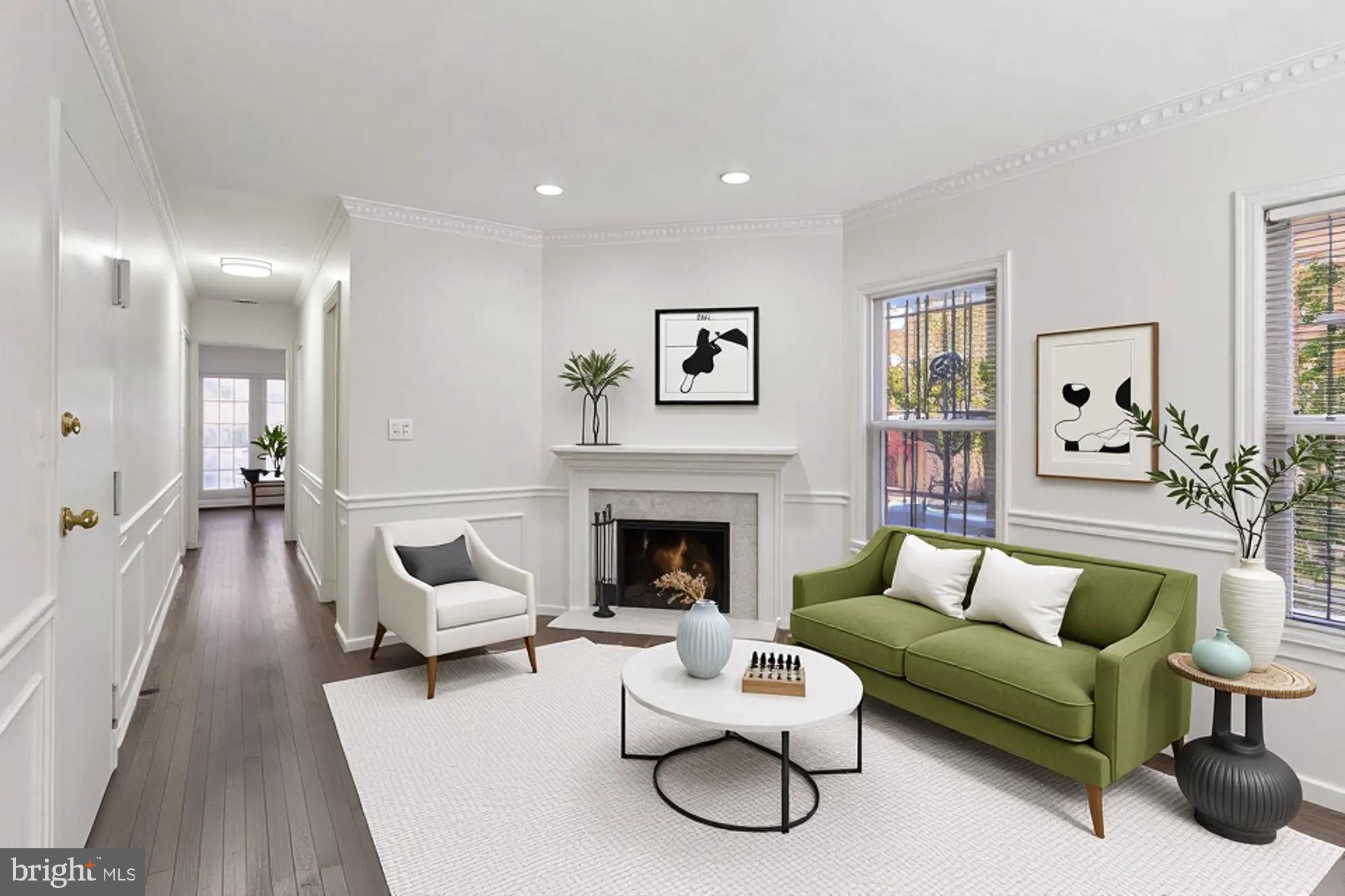 1690 Euclid Street Northwest, Unit A Washington, DC 20009 - Photo 15 of 38 a living room with furniture and a fireplace