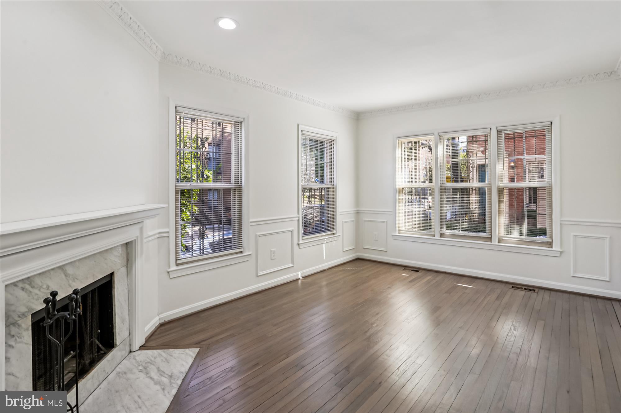 1690 Euclid Street Northwest, Unit A Washington, DC 20009 - Photo 19 of 38 a view of livingroom with furniture wooden floor and window