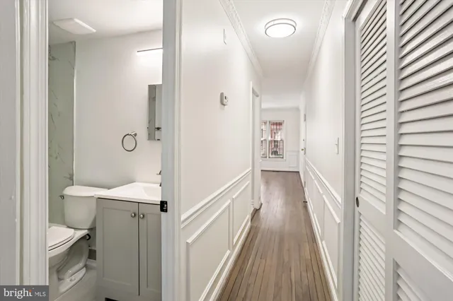 a view of a bathroom from the hallway