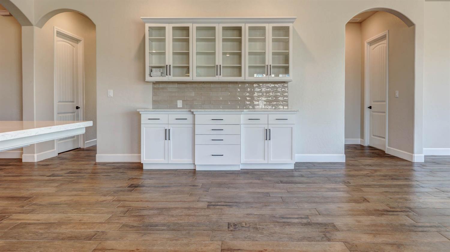 1742 North Applegate Avenue Clovis, CA 93619 - Photo 15 of 31 a view of kitchen with granite countertop cabinets and wooden floor