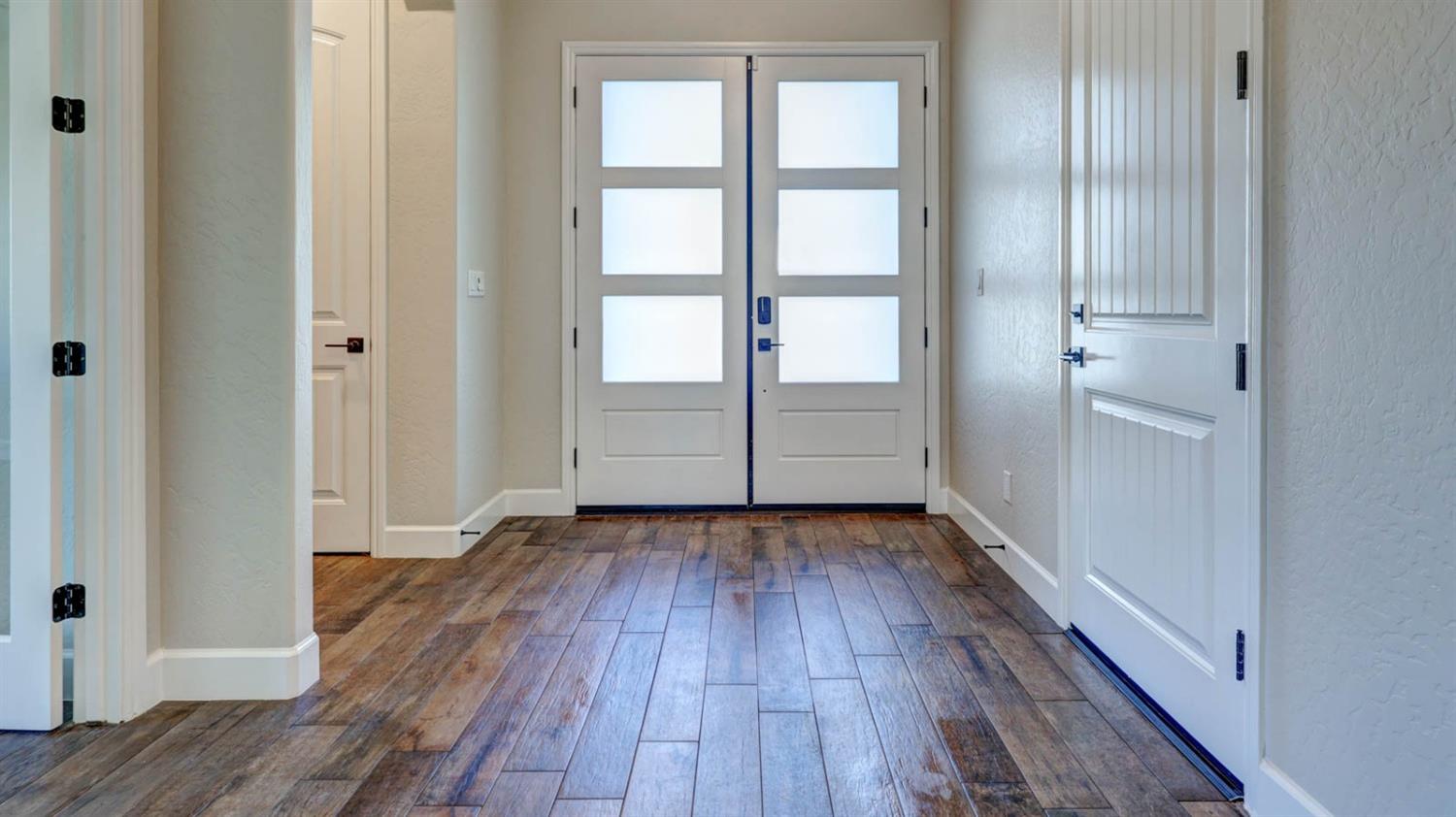 1742 North Applegate Avenue Clovis, CA 93619 - Photo 3 of 31 wooden floor in an empty room with wooden floor
