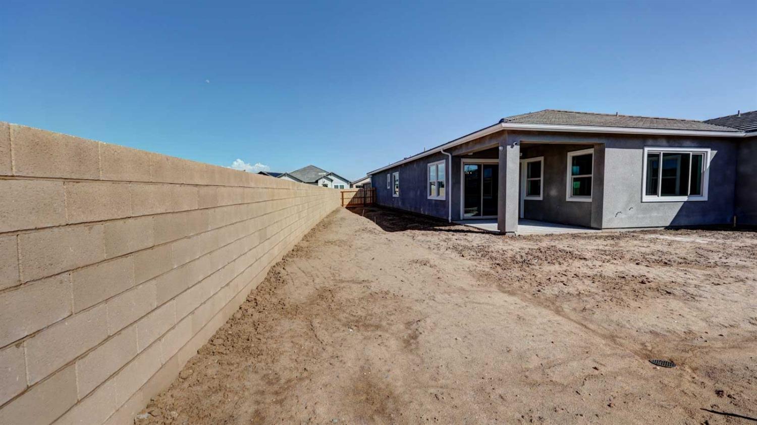 1742 North Applegate Avenue Clovis, CA 93619 - Photo 31 of 31 a view of house with yard and covered in snow