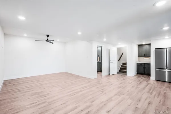 a bathroom with a double vanity sink mirror and