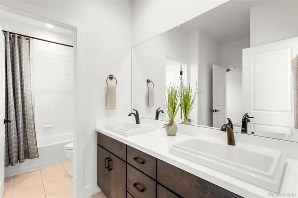 a view of a chairs and table in a room