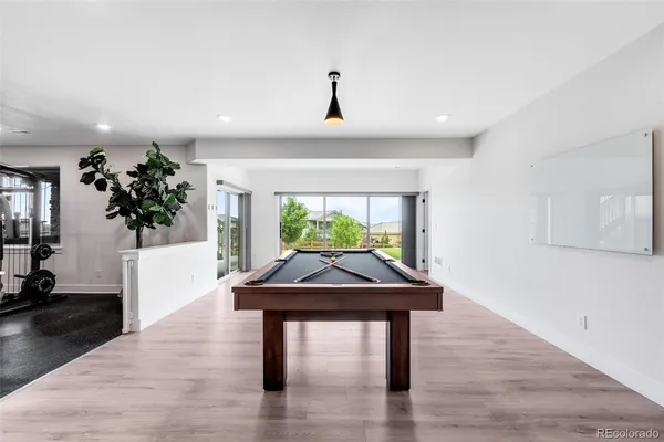 a room with furniture and wooden floor