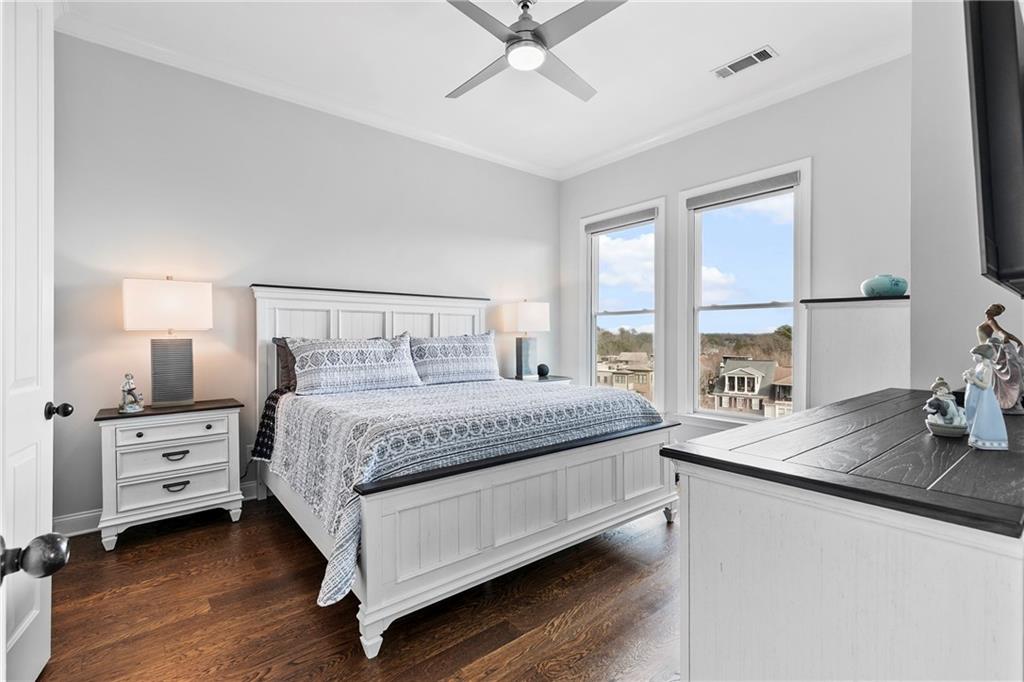 360 Chambers Street, Unit 309 Woodstock, GA 30188 - Photo 17 of 58 a bedroom with a bed and large window