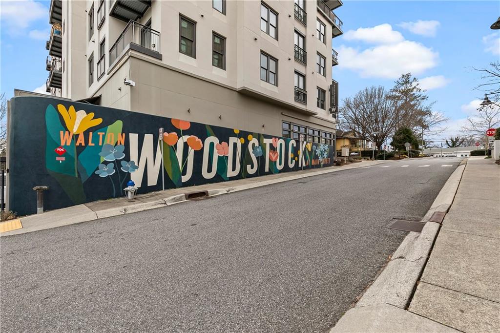 360 Chambers Street, Unit 309 Woodstock, GA 30188 - Photo 39 of 58 a view of a street with building